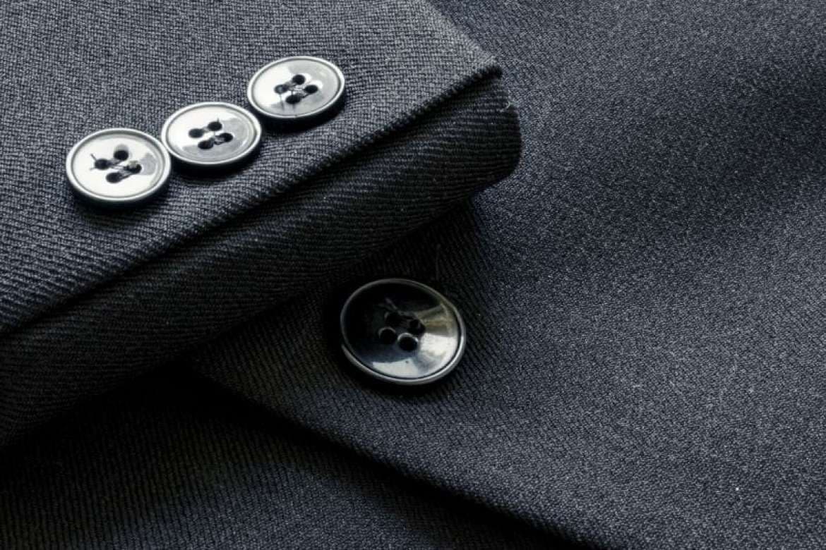 Fabric buttons displayed for choosing a custom suit.