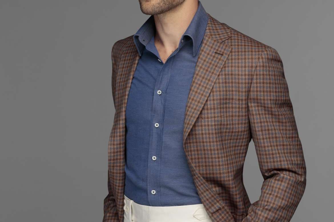 Suit jacket styled casually as a sport coat.