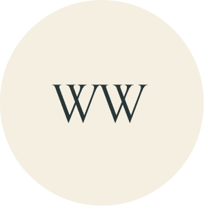 Cream circular monogram with WW initials.