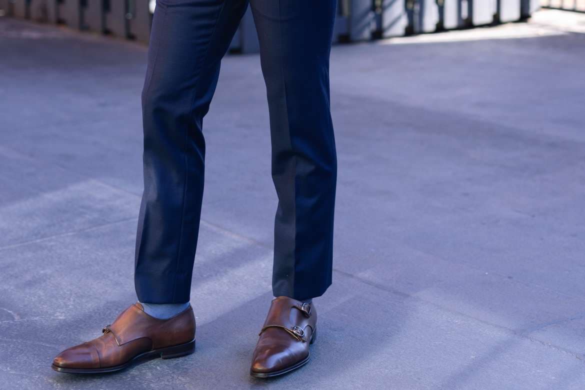 Men’s dress shoes styled with different suit fabrics.