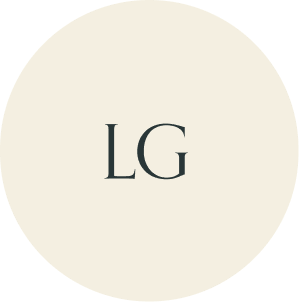 Cream circular monogram with LG initials.