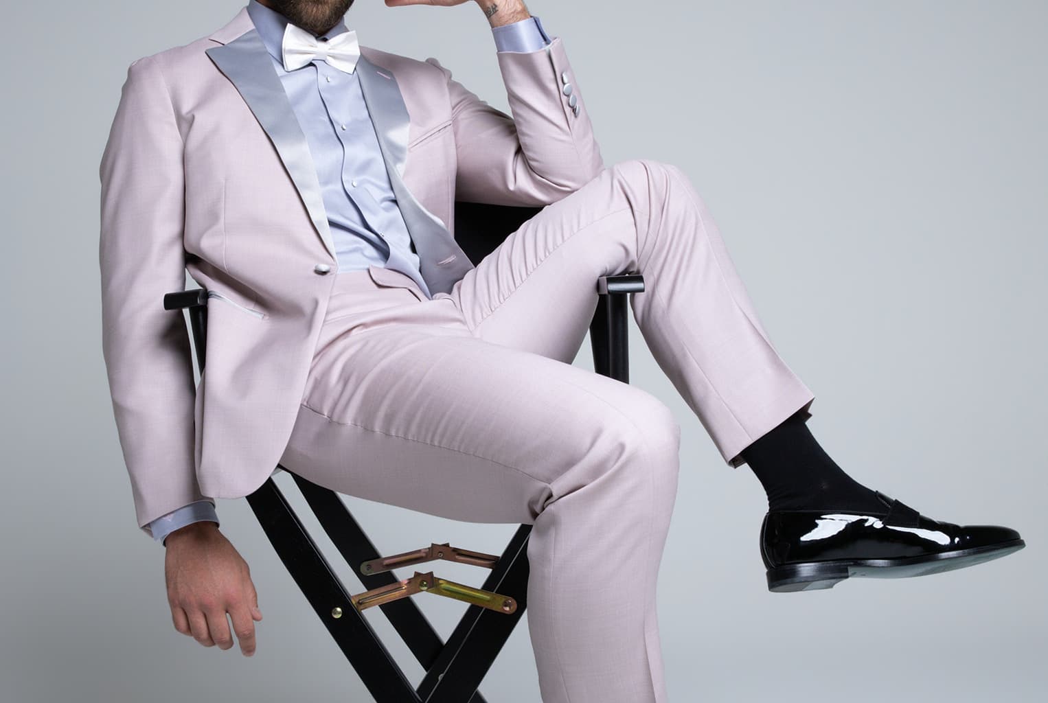 Man in a silver and grey tuxedo