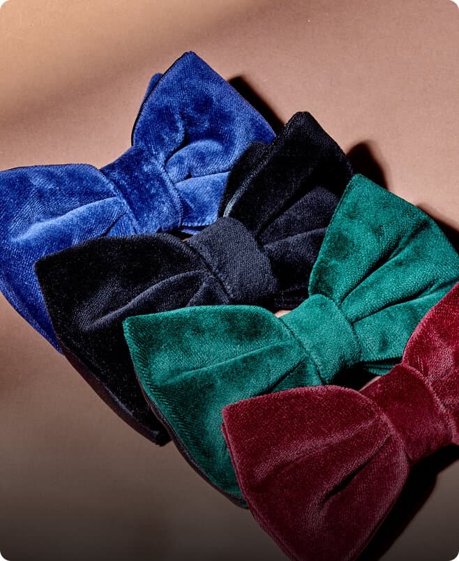 Bow ties displayed for a menswear accessories collection.