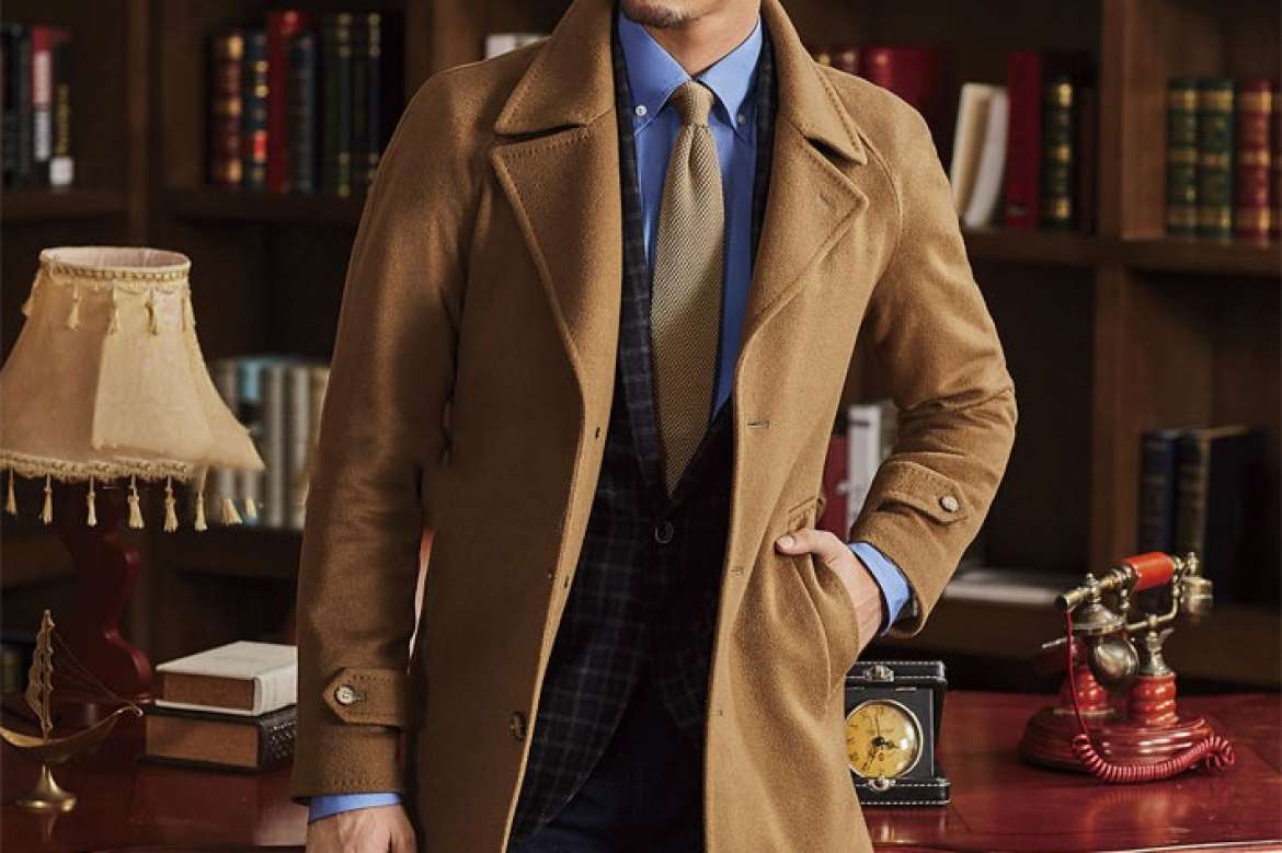 Man wearing a dress shirt with a casual overcoat.
