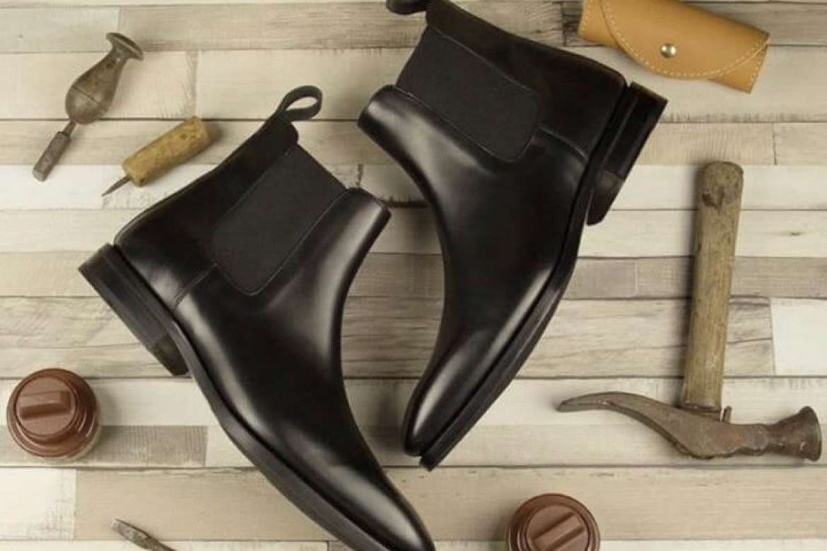 Custom dress shoes displayed for bespoke menswear.
