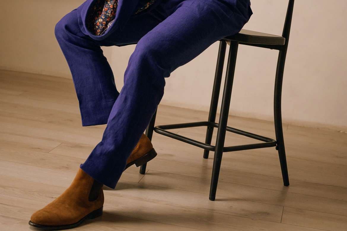 Custom dress shoes paired with tailored menswear.