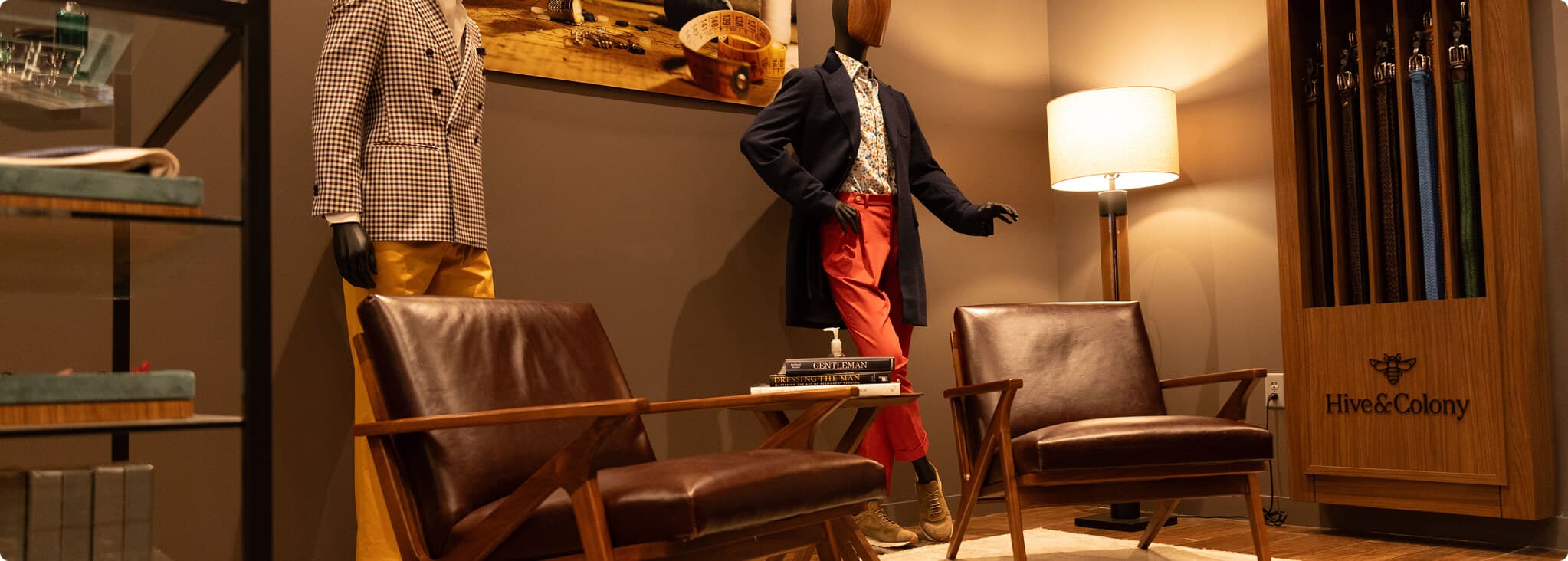 Hive & Colony showroom lounge with mannequins and fabric displays.